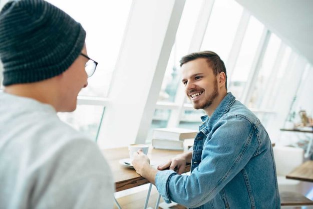 intensive outpatient program scottsdale two young men laughing in an intensive outpatient program scottsdale offers