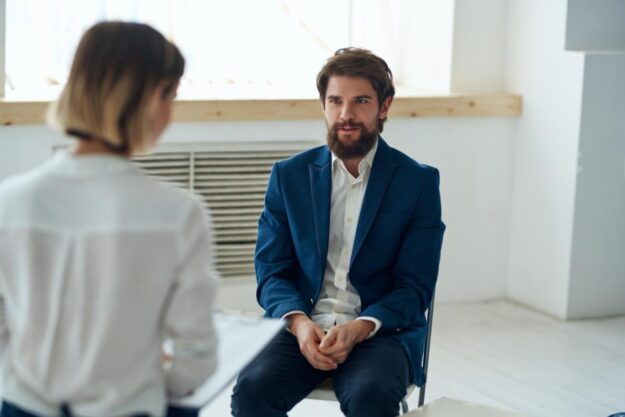 man in suit in luxury addiction treatment for executives
